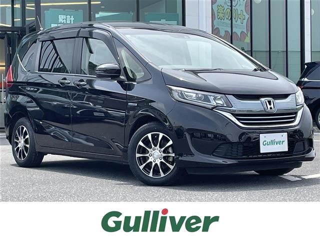 フリードハイブリッド ハイブリッド・Ｇホンダセンシング　社外ナビ　ＤＶＤ／ＤＴＶ／Ｂｌｕｅｔｏｏｔｈ　バックカメラ　レーダークルーズコントロール　両側パワースライドドア　ステアリングスイッチ　ＬＥＤオートライト　ビルトインＥＴＣ　レーンキープ　スマートキー（32枚目）