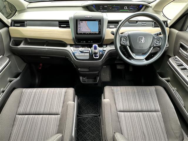 フリードハイブリッド ハイブリッド・Ｇホンダセンシング　純正ナビ☆ＣＤ／ＤＶＤ／ＤＴＶ／Ｂｌｕｅｔｏｏｔｈ☆バックカメラ☆レーダークルーズコントロール☆両側パワースライドドア☆ＬＥＤオートライト☆ビルトインＥＴＣ☆レーンキープ☆スマートキー（27枚目）