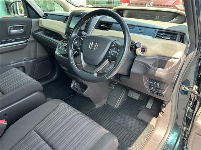 フリードハイブリッド ハイブリッド・Ｇホンダセンシング　社外ナビ　ＣＤ／ＤＶＤ／ＤＴＶ／Ｂｌｕｅｔｏｏｔｈ　バックカメラ　両側パワースライドドア　レーダークルーズコントロール　ビルトインＥＴＣ　ＬＥＤオートライト　ステアリングスイッチ　フロアマット（26枚目）