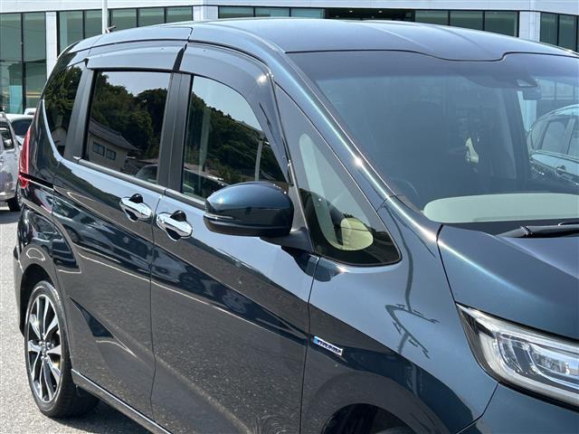 フリードハイブリッド ハイブリッド・Ｇホンダセンシング　社外ナビ　ＣＤ／ＤＶＤ／ＤＴＶ／Ｂｌｕｅｔｏｏｔｈ　バックカメラ　両側パワースライドドア　レーダークルーズコントロール　ビルトインＥＴＣ　ＬＥＤオートライト　ステアリングスイッチ　フロアマット（35枚目）