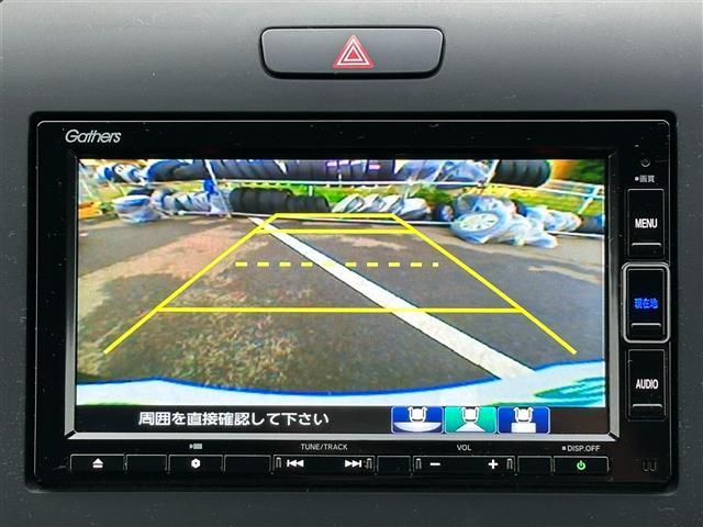 フリードハイブリッド ハイブリッド・Ｇホンダセンシング　純正ナビ　ＣＤ／ＤＶＤ／ＤＴＶ／Ｂｌｕｅｔｏｏｔｈ　バックカメラ　両側パワースライドドア　レーダークルーズコントロール　純正ホイール付きサマータイヤ積込　ＬＥＤオートライト　前後ドラレコ　ＥＴＣ（3枚目）