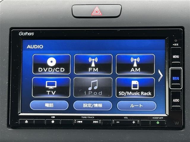 フリードハイブリッド ハイブリッド・Ｇホンダセンシング　純正ナビ　ＣＤ／ＤＶＤ／ＤＴＶ／Ｂｌｕｅｔｏｏｔｈ　バックカメラ　両側パワースライドドア　レーダークルーズコントロール　純正ホイール付きサマータイヤ積込　ＬＥＤオートライト　前後ドラレコ　ＥＴＣ（7枚目）