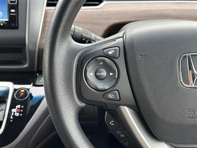 フリードハイブリッド ハイブリッド・Ｇホンダセンシング　純正ナビ　ＣＤ／ＤＶＤ／ＤＴＶ／Ｂｌｕｅｔｏｏｔｈ　バックカメラ　両側パワースライドドア　レーダークルーズコントロール　純正ホイール付きサマータイヤ積込　ＬＥＤオートライト　前後ドラレコ　ＥＴＣ（14枚目）
