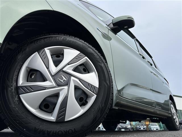フリードハイブリッド ハイブリッド・Ｇホンダセンシング　純正ナビ　ＣＤ／ＤＶＤ／ＤＴＶ／Ｂｌｕｅｔｏｏｔｈ　バックカメラ　両側パワースライドドア　レーダークルーズコントロール　純正ホイール付きサマータイヤ積込　ＬＥＤオートライト　前後ドラレコ　ＥＴＣ（35枚目）