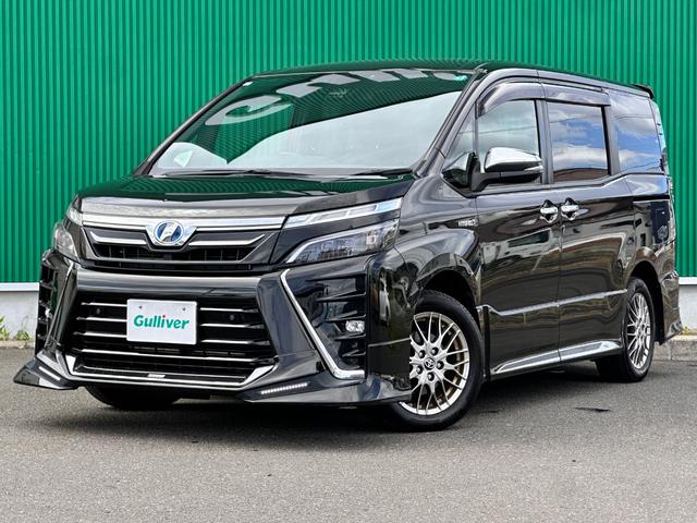 ヴォクシー ハイブリッドＺＳ　煌ＩＩ　ＴＲＤエアロ　７人乗り　セーフティセンス　クルーズコントロール　１０．２インチフリップダウンモニター　９インチナビ　バックカメラ　ＥＴＣ　両側電動スライドドア　シートヒーター　純正１６インチＡＷ（19枚目）