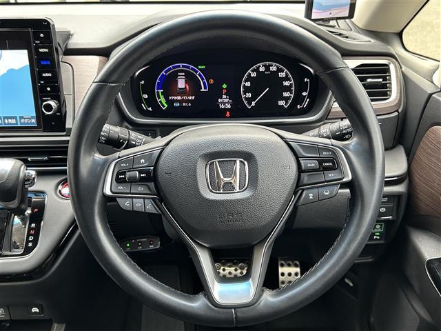 オデッセイハイブリッド ｅ：ＨＥＶアブソルート・ＥＸ　１オーナー／純正１０型ナビ／全周囲カメラ／ＴＥＩＮ車高調／マーベリック２０インチＡＷ／フリップダウン／デジタルインナーミラー／両側パワースライドドア／シーケンシャルランプ／ハンズフリーパワーゲート（20枚目）
