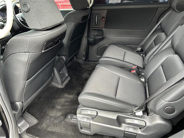 オデッセイハイブリッド ｅ：ＨＥＶアブソルート・ＥＸ　１オーナー／純正１０型ナビ／全周囲カメラ／ＴＥＩＮ車高調／マーベリック２０インチＡＷ／フリップダウン／デジタルインナーミラー／両側パワースライドドア／シーケンシャルランプ／ハンズフリーパワーゲート（28枚目）