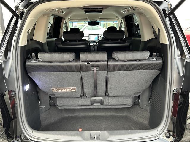 オデッセイハイブリッド ｅ：ＨＥＶアブソルート・ＥＸ　１オーナー／純正１０型ナビ／全周囲カメラ／ＴＥＩＮ車高調／マーベリック２０インチＡＷ／フリップダウン／デジタルインナーミラー／両側パワースライドドア／シーケンシャルランプ／ハンズフリーパワーゲート（29枚目）