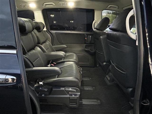 オデッセイハイブリッド ハイブリッドアブソルート・EXホンダセンシング ディスプレイオーディオ/フリップダウンモニター/両側パワースライドドア/マルチビューカメラ/ブラインドスポットモニター/パワーシート/シートヒーター/オットマン/ホンダセンシング/ビルトインETC(7枚目)