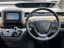 フリードハイブリッド ハイブリッド・Ｇホンダセンシング　純正ナビ☆ＣＤ／ＤＶＤ／ＤＴＶ／Ｂｌｕｅｔｏｏｔｈ☆バックカメラ☆レーダークルーズコントロール☆両側パワースライドドア☆ＬＥＤオートライト☆ビルトインＥＴＣ☆レーンキープ☆スマートキー（3枚目）