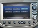フィットハイブリッド ＸＨセレクション　純正ＨＤＤナビ　ＣＤ／ＤＶＤ／ワンセグＴＶ　バックカメラ　クルーズコントロール　ステアリングスイッチ　パドルシフト　シートヒーター　ビルトインＥＴＣ　スマートキー　スペアキー　ワイパーデアイサー（5枚目）
