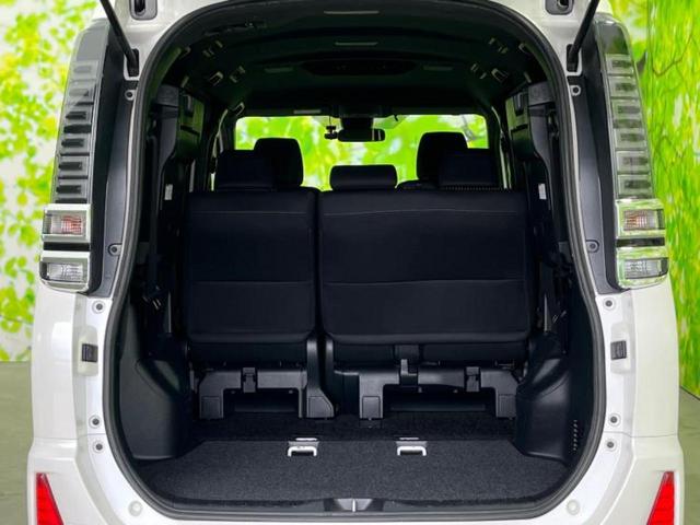 ヴォクシー ZSキラメキ 新品タイヤ/社外 9インチ SDナビ/トヨタセーフティセンス/両側電動スライドドア/ヘッドランプ LED/ETC/EBD付ABS/横滑り防止装置/アイドリングストップ/フルセグTV/MTモード付き(21枚目)