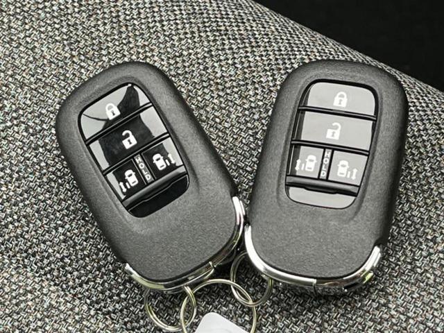 フリード eHEVエアー 保証書/純正 8インチ ナビ/ホンダセンシング/両側電動スライドドア/車線逸脱防止支援システム/登録済未使用車/ヘッドランプ LED/USBジャック/Bluetooth接続/EBD付ABS 禁煙車(34枚目)