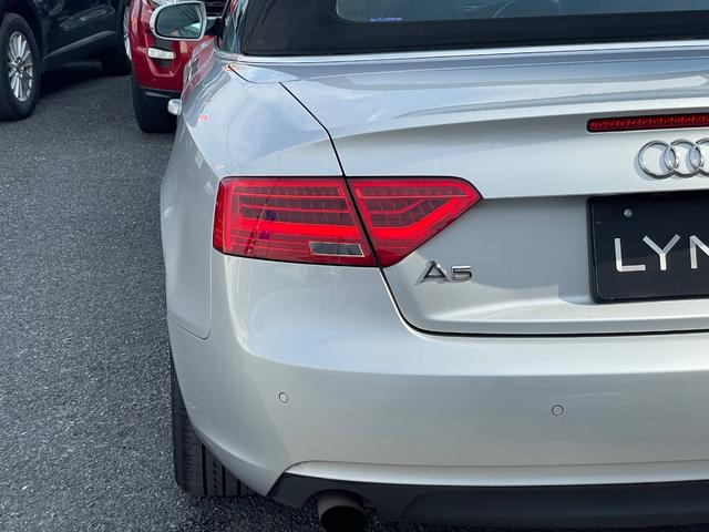 Ａ５カブリオレ ２．０ＴＦＳＩクワトロ　黒革　電動幌　ナビ　バックカメラ　ＴＶ　ＥＴＣ　シートヒーター　禁煙車　ウッドパネル　ＢＳＭ　１８インチ純正アルミホイール（70枚目）