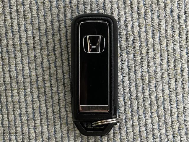 Ｎ－ＷＧＮ Ｌホンダセンシング　ディスプレイオーディオ　バックカメラ　ＥＴＣ　Ｂｌｕｅｔｏｏｔｈ　地デジ　ドラレコ　シートヒーター　衝突軽減ブレーキ　レーンキープアシスト　先行車発進告知　追従クルコン　オートヘッドライト（21枚目）