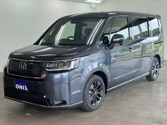 ステップワゴン スパーダ　登録済未使用車　ホンダセンシング　両側パワースライドドア　バックカメラ　電動パーキング　オットマン　アルミホイール　パワーテールゲート　ＬＥＤヘッドライト（10枚目）