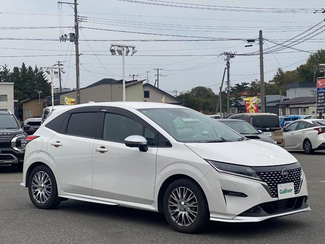 ノート オーテック　ＦＯＵＲ　ワンオーナー　４ＷＤ　純正メモリナビ（ＢＴ／ＡＭ／ＦＭ／ＤＶＤ）純正エアロ　全周囲方位カメラ　黒レザーシート（ＡＵＴＣＨ）シートヒーター（運転席＋助手席）ステアリングスイッチ　ステアリングヒーター（65枚目）