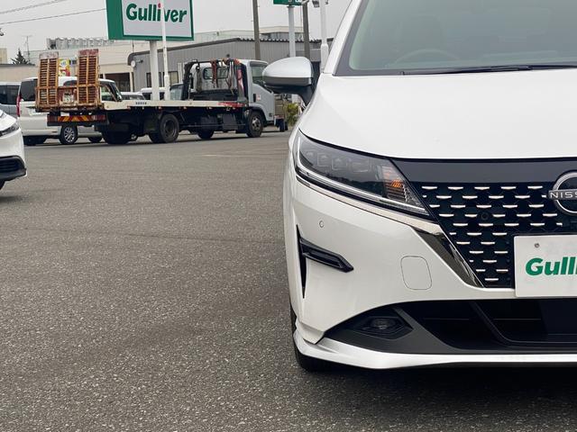 ノート オーテック　ＦＯＵＲ　ワンオーナー　４ＷＤ　純正メモリナビ（ＢＴ／ＡＭ／ＦＭ／ＤＶＤ）純正エアロ　全周囲方位カメラ　黒レザーシート（ＡＵＴＣＨ）シートヒーター（運転席＋助手席）ステアリングスイッチ　ステアリングヒーター（66枚目）