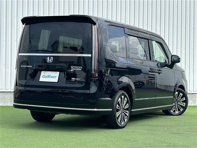 ステップワゴン ｅ：ＨＥＶスパーダ　プレミアムライン　禁煙車　純正ナビ　後席モニター　ホンダセンシング　全方位カメラ　ＢＳＭ　ＬＥＤライト　ハーフレザーシート　シートヒーター　両側パワスラ　電動リアゲート　電子パーキング　オートブレーキホールド　ＥＴＣ（10枚目）