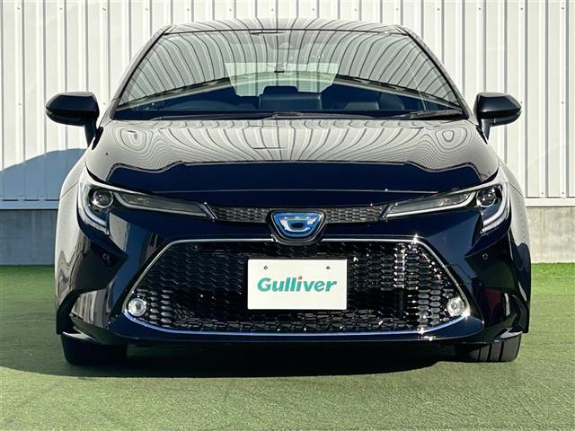 カローラツーリング ハイブリッド ダブルバイビー 禁煙車 純正9型ディスプレイオーディオ トヨタセーフティーセンス バックカメラ ブラインドスポットモニター 革巻きステアリング ステアリングヒーター シートヒーター エアーシート LEDヘッドライト(5枚目)