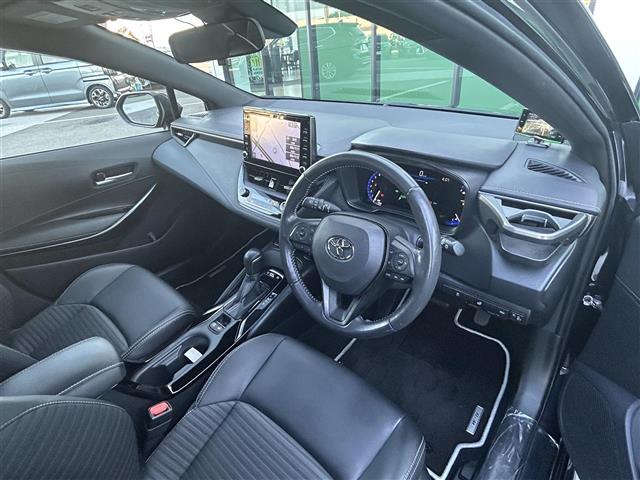カローラツーリング ハイブリッド ダブルバイビー 禁煙車 純正9型ディスプレイオーディオ トヨタセーフティーセンス バックカメラ ブラインドスポットモニター 革巻きステアリング ステアリングヒーター シートヒーター エアーシート LEDヘッドライト(14枚目)