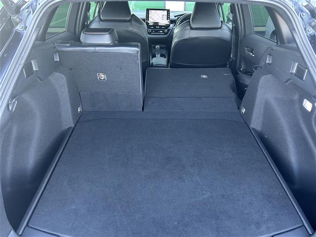 カローラツーリング ハイブリッド ダブルバイビー 禁煙車 純正9型ディスプレイオーディオ トヨタセーフティーセンス バックカメラ ブラインドスポットモニター 革巻きステアリング ステアリングヒーター シートヒーター エアーシート LEDヘッドライト(20枚目)