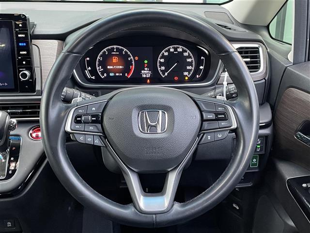 オデッセイ アブソルート 禁煙車 純正10型ナビ 全方位 後席モニター 両側パワスラ ハーフレザーシート パワーシート オットマン 革巻きステアリング ステアリングリモコン LEDヘッドライト スマートキー プッシュスタート(16枚目)