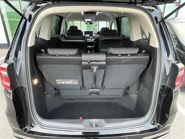 オデッセイ アブソルート 禁煙車 純正10型ナビ 全方位 後席モニター 両側パワスラ ハーフレザーシート パワーシート オットマン 革巻きステアリング ステアリングリモコン LEDヘッドライト スマートキー プッシュスタート(23枚目)