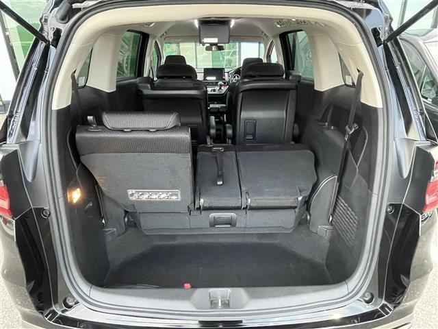 オデッセイ アブソルート 禁煙車 純正10型ナビ 全方位 後席モニター 両側パワスラ ハーフレザーシート パワーシート オットマン 革巻きステアリング ステアリングリモコン LEDヘッドライト スマートキー プッシュスタート(24枚目)