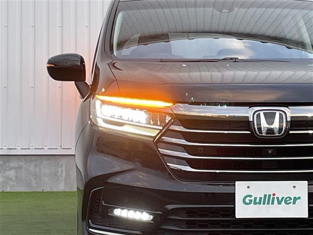 オデッセイ アブソルート 禁煙車 純正10型ナビ 全方位 後席モニター 両側パワスラ ハーフレザーシート パワーシート オットマン 革巻きステアリング ステアリングリモコン LEDヘッドライト スマートキー プッシュスタート(37枚目)