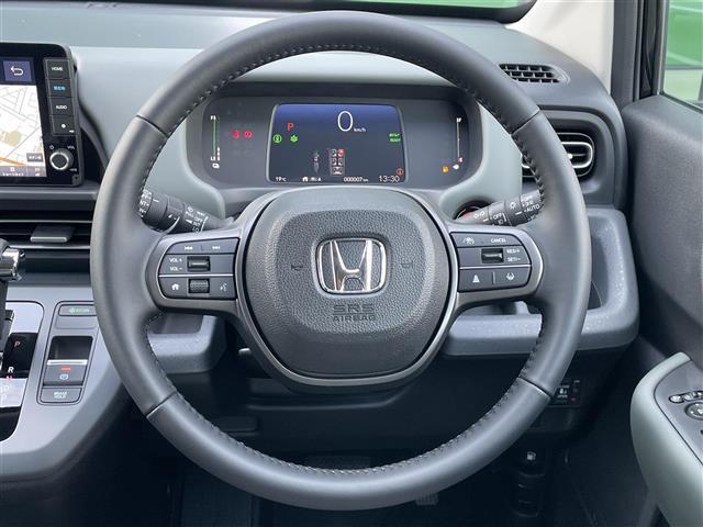 フリード e:HEVクロスター 登録済未使用車 純正9型ナビ バックカメラ ホンダセンシング 両側パワースライドドア シートヒーター ブラインドスポットモニター LEDライト 革巻きステアリング ステアリングリモコン スマートキー(8枚目)