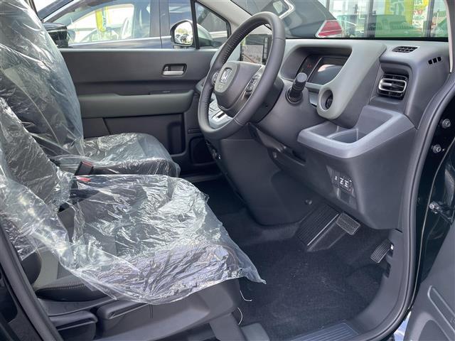 フリード e:HEVクロスター 登録済未使用車 純正9型ナビ バックカメラ ホンダセンシング 両側パワースライドドア シートヒーター ブラインドスポットモニター LEDライト 革巻きステアリング ステアリングリモコン スマートキー(22枚目)