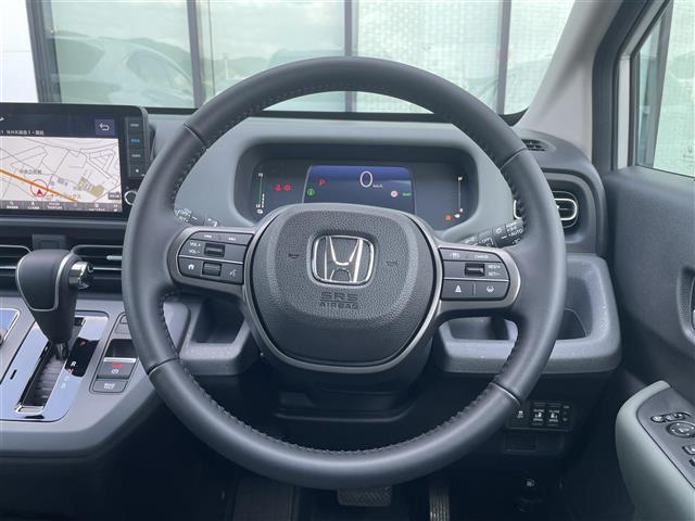 フリード e:HEVクロスター 登録済未使用車 純正9型ナビ バックカメラ ホンダセンシング 両側パワースライドドア シートヒーター ブラインドスポットモニター LEDライト 革巻きステアリング ステアリングリモコン スマートキー(10枚目)