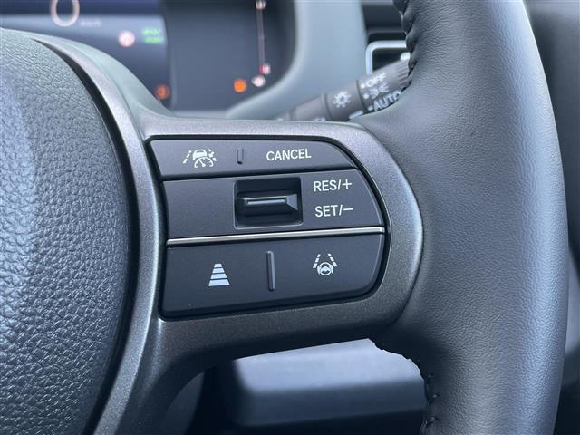 フリード e:HEVクロスター 登録済未使用車 純正9型ナビ バックカメラ ホンダセンシング 両側パワースライドドア シートヒーター ブラインドスポットモニター LEDライト 革巻きステアリング ステアリングリモコン スマートキー(12枚目)