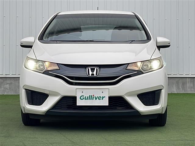 フィット 13G・Lパッケージ 禁煙 純正7型SDナビ ETC LEDヘッド 純正フロアマット プッシュスタート スマートキー アイドリングストップ パワーステアリング パワーウィンドウ オートライト 盗難防止装置 Wエアバッグ(11枚目)