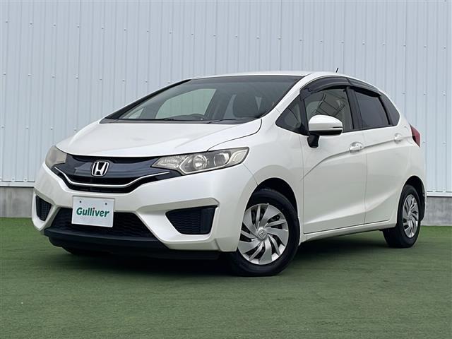 フィット 13G・Lパッケージ 禁煙 純正7型SDナビ ETC LEDヘッド 純正フロアマット プッシュスタート スマートキー アイドリングストップ パワーステアリング パワーウィンドウ オートライト 盗難防止装置 Wエアバッグ(12枚目)