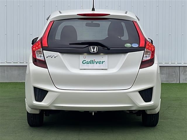 フィット 13G・Lパッケージ 禁煙 純正7型SDナビ ETC LEDヘッド 純正フロアマット プッシュスタート スマートキー アイドリングストップ パワーステアリング パワーウィンドウ オートライト 盗難防止装置 Wエアバッグ(14枚目)