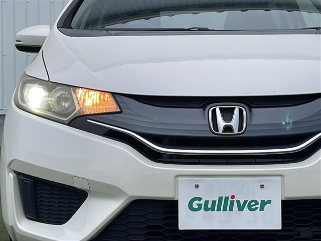 フィット 13G・Lパッケージ 禁煙 純正7型SDナビ ETC LEDヘッド 純正フロアマット プッシュスタート スマートキー アイドリングストップ パワーステアリング パワーウィンドウ オートライト 盗難防止装置 Wエアバッグ(17枚目)