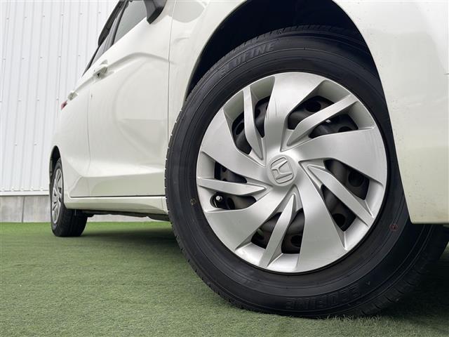 フィット 13G・Lパッケージ 禁煙 純正7型SDナビ ETC LEDヘッド 純正フロアマット プッシュスタート スマートキー アイドリングストップ パワーステアリング パワーウィンドウ オートライト 盗難防止装置 Wエアバッグ(21枚目)