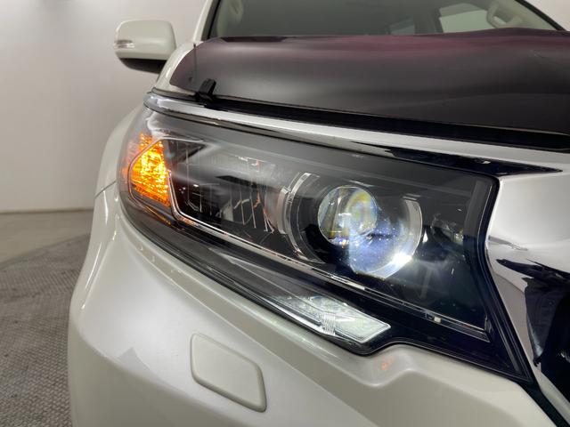 ランドクルーザープラド ＴＸ　Ｌパッケージ　ＴＲＤエアロ／ムーンルーフ／ＫＥＮＷＯＯＤフローディングナビ／バックカメラ／トヨタセーフティセンス／ベージュレザー／パワーシート／シートヒーター／エアシート／バグガード／リアラダー／純正ＡＷ／ＬＥＤ（19枚目）