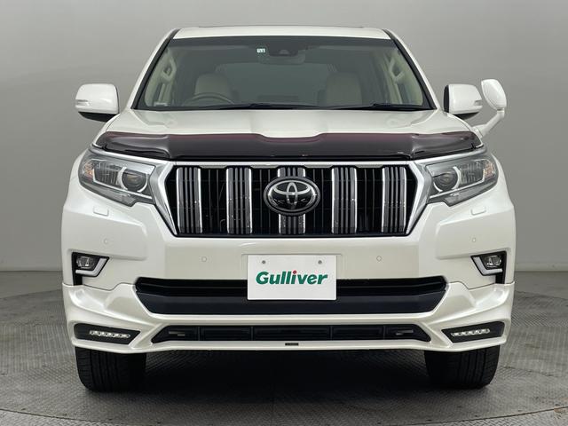 ランドクルーザープラド ＴＸ　Ｌパッケージ　ＴＲＤエアロ／ムーンルーフ／ＫＥＮＷＯＯＤフローディングナビ／バックカメラ／トヨタセーフティセンス／ベージュレザー／パワーシート／シートヒーター／エアシート／バグガード／リアラダー／純正ＡＷ／ＬＥＤ（23枚目）