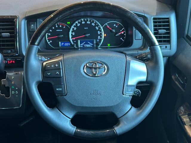 ハイエースバン スーパーGL ダークプライムII 衝突軽減システム LKA 社外ナビ バックカメラ 両側パワースライド LEDヘッドライト 社外LEDテールランプ フロントバンパーガード 17インチAWラギッドテレーンタイヤ 社外ベッドキット ETC(26枚目)