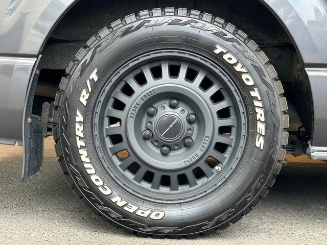 ハイエースバン スーパーGL ダークプライムII 衝突軽減システム LKA 社外ナビ バックカメラ 両側パワースライド LEDヘッドライト 社外LEDテールランプ フロントバンパーガード 17インチAWラギッドテレーンタイヤ 社外ベッドキット ETC(66枚目)