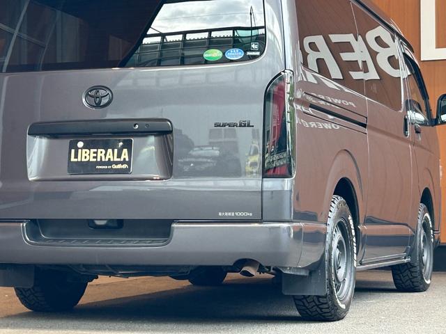 ハイエースバン スーパーGL ダークプライムII 衝突軽減システム LKA 社外ナビ バックカメラ 両側パワースライド LEDヘッドライト 社外LEDテールランプ フロントバンパーガード 17インチAWラギッドテレーンタイヤ 社外ベッドキット ETC(72枚目)