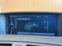 １３５ｉ　ＬＣＩモデル　ｉＤｒｉｖｅナビ　黒革　シートヒーター　パワーシート　キセノンヘッドライト　オートライト　フロント／バックカメラ　プッシュエンジンスタート　１８インチＡＷ　ＥＴＣ　ステアリングスイッチ（13枚目）
