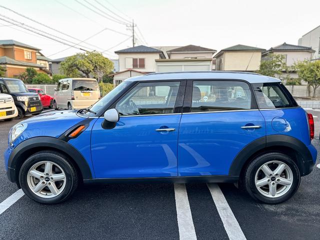 クーパー クロスオーバー 禁煙車 カロッツェリアETC 車内外ドラレコ プッシュスタート 純正16インチアルミ グリル・サイドマーカーカバー艶ありブラックペイント済 ブルーxホワイトツートン ルーフレール 電動格納ミラー(7枚目)