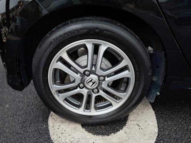 Ｎ－ＷＧＮカスタム Ｇ・ターボパッケージ　全国対応１年保証付　禁煙車　半革シート　衝突軽減ブレーキ　ターボ　パドルシフト　クルコン　プッシュスタート　スマートキ　フルオートエアコン　ＨＩＤヘッドライト　フルエアロ　１４インチアルミ　ローダウン（22枚目）