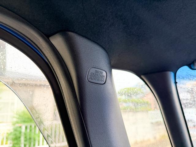 N-BOXカスタム G・Lホンダセンシング 青/黒ツートンカラー モデューロ14インチホイール 純正OP8インチインターナビ 地デジTV Bluetooth バックカメラ フルオートエアコン 両側パワースライドドア ビルトインETC クルコン(42枚目)