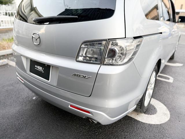 MPV 23C スポーティパッケージ Uスタイル 禁煙車 両側パワースライドドア 純正OPナビ バックカメラ HIDヘッドライト フォグ ミラーウインカー 17インチアルミ キーレス フルオートエアコン 8人乗り ブラックインテリア オットマン(21枚目)