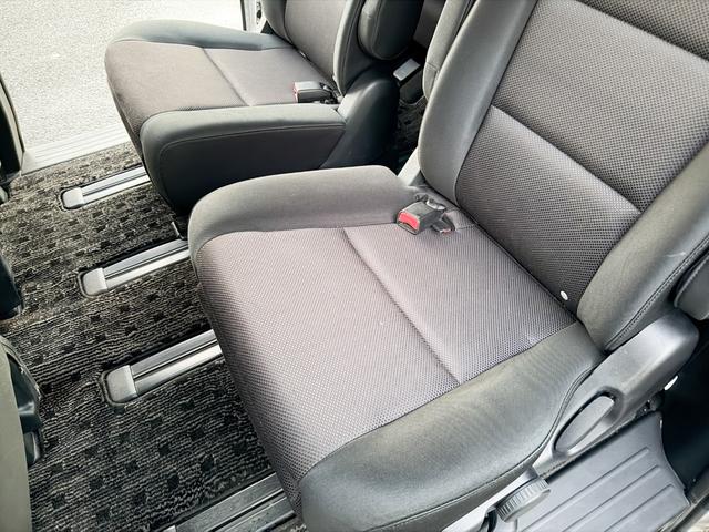 MPV 23C スポーティパッケージ Uスタイル 禁煙車 両側パワースライドドア 純正OPナビ バックカメラ HIDヘッドライト フォグ ミラーウインカー 17インチアルミ キーレス フルオートエアコン 8人乗り ブラックインテリア オットマン(76枚目)
